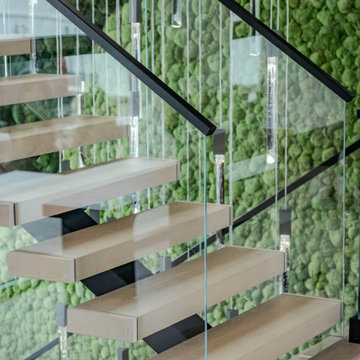 Electic Switchback Staircase with Glass Railing