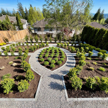 AFTER - Formal boxwood planting in the lower garden with lavender center