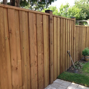 Backyard Interlock Paver Patio with setp down, New Wooden Fence with custom gate