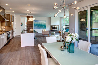 Open concept kitchen - modern open concept kitchen idea in Seattle with an island