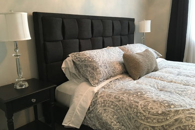 Example of a mid-sized classic master bedroom design in Other with gray walls