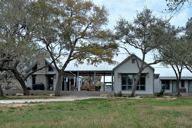 Rustic exterior home idea in Austin