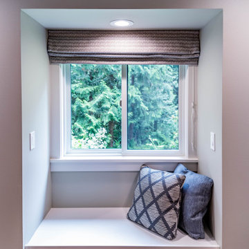 Spacious Gray Bedroom with Seating Area