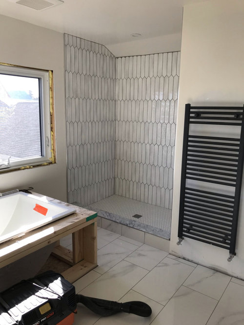 Wrought Iron vs Matte Black Moen