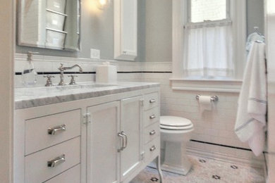 Inspiration for a mid-sized timeless master black and white tile and ceramic tile marble floor alcove bathtub remodel in DC Metro with an undermount sink, flat-panel cabinets, white cabinets, marble countertops, a two-piece toilet and green walls