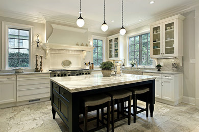 Inspiration for a mid-sized timeless l-shaped medium tone wood floor and beige floor enclosed kitchen remodel in Toronto with an undermount sink, medium tone wood cabinets, beige backsplash, stainless steel appliances, an island, glass-front cabinets, marble countertops and stone slab backsplash
