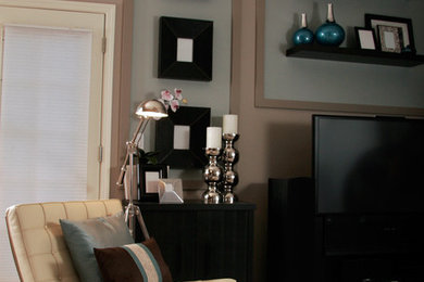 Example of a mid-sized transitional open concept carpeted living room design in Sacramento with beige walls and a tv stand