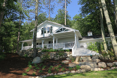 Photo of a mid-sized craftsman shade hillside mulch garden path in Other for spring.