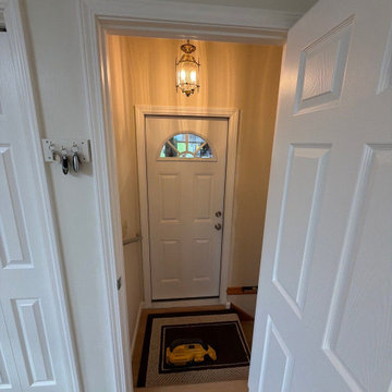 New doors entering remodeled laundry room