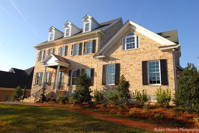 Example of a classic exterior home design in Other