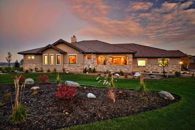 This is an example of a transitional home design in Denver.