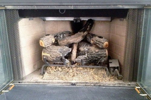 What Happens If You Burn Wood in a Gas Fireplace