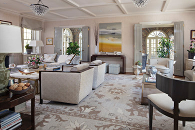 Example of an eclectic open concept medium tone wood floor living room design in Philadelphia with beige walls, a standard fireplace and a stone fireplace
