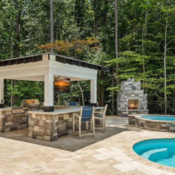 Check out this home done in our Centurion Norris Gray Stack and Ivory Travertine