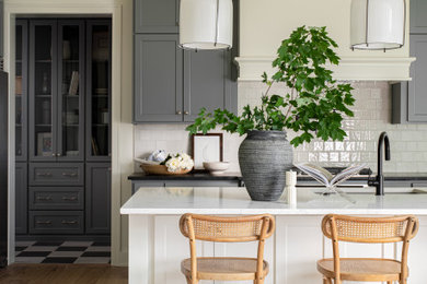 Example of a beach style kitchen design in Kansas City