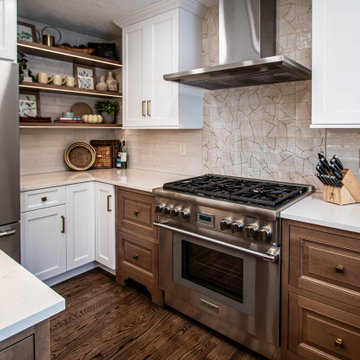 Two Tone Kitchen with Floating Shelves and Island Seating and Updated Fireplace