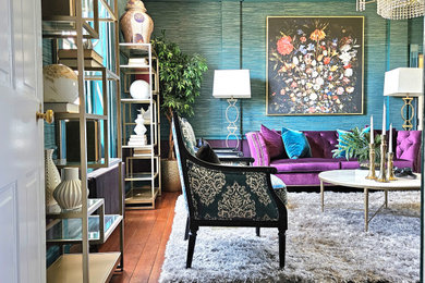Inspiration for a mid-sized eclectic formal and enclosed medium tone wood floor and wallpaper living room remodel in DC Metro with a standard fireplace