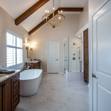 Luxury Spa Bathroom with Natural Warm Vanities, Quartz Countertop, Tiled Shower