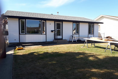 White vinyl house exterior photo in Edmonton