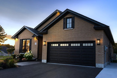 Transitional exterior home idea in Toronto