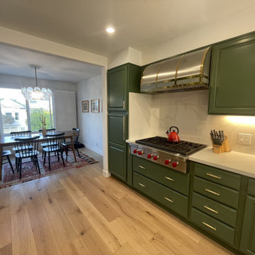 The suitability of Green Cabinet and Custom Stainless Steel Range Hood