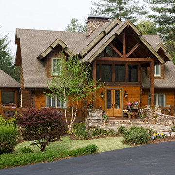 Front of Log and Timber Home with Inviting Front Porch
