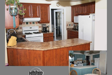 Design ideas for a mid-sized traditional kitchen in Toronto with recessed-panel cabinets and laminate benchtops.