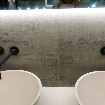 Grey Travertine on a Roll wall in a modern bathroom