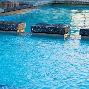 DS Grinding Services: Honed Concrete with infinity pool surround