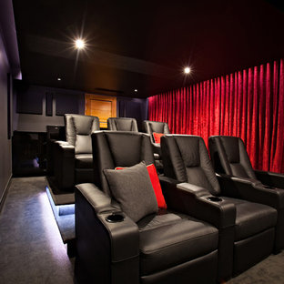 Inspiration for a small contemporary enclosed carpeted home theater remodel in Brisbane with black walls and a projector screen