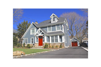 Inspiration for a blue traditional house exterior in DC Metro with concrete fibreboard cladding.