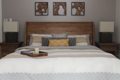 This is an example of a mid-sized country master bedroom in New York with beige walls, carpet and no fireplace.