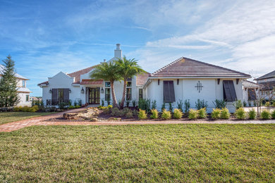 Inspiration for a southwestern exterior home remodel in Jacksonville
