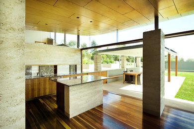 Design ideas for a contemporary kitchen in Newcastle - Maitland with stone slab splashback and with island.