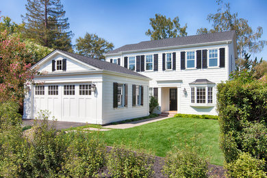 Example of a large classic white two-story wood gable roof design in San Francisco