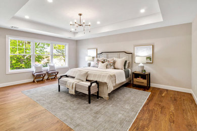 Example of a transitional bedroom design in New York