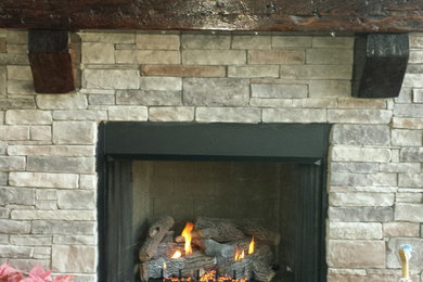Inspiration for a craftsman dark wood floor living room remodel in Other with a standard fireplace, a tile fireplace and a wall-mounted tv