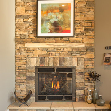 Wrought Iron faced Gas Fireplace with stack stone