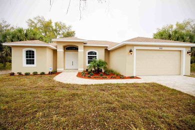 Inspiration for a transitional exterior home remodel in Miami