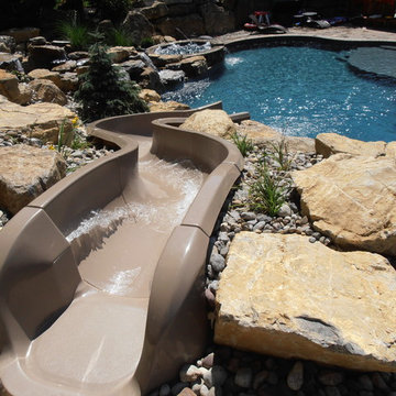City of Allentown custom salt water pool with spa, slide, sunshelf, & waterfall