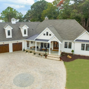 French country, lodge-style riverfront home