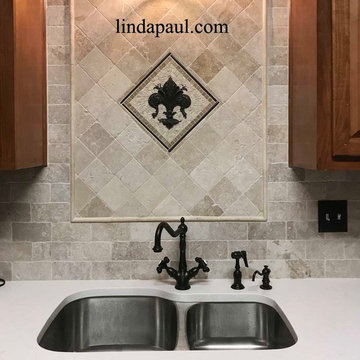 Fleur de lis tile medallion kitchen backsplash