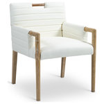 Meridian Furniture - Aimee Upholstered Dining Arm Chair, Cream, Vegan Leather, Natural - A perfect fusion of modern elegance and eco-friendly luxury is the Aimee cream vegan leather dining armchair. Upholstered in sleek vegan leather, this chair offers a chic, contemporary look while maintaining a commitment to sustainable living. The padded, quilted design featuring solid natural oak wood legs and armrests creates a stunning contrast between its soft upholstery and minimalist frame.