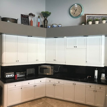 Resurfaced kichen with white, textured doors