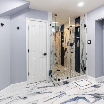 Bathroom remodeling in Columbia, MD with double vanity & marble bathtub