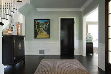 Traditional hallway in Los Angeles with blue walls and black floor.