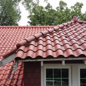 Cleaning and restoration of near 100-year-old Spanish S clay tile.