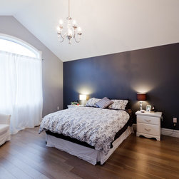 Bright Neutral Master Bedroom - Hardwood Flooring