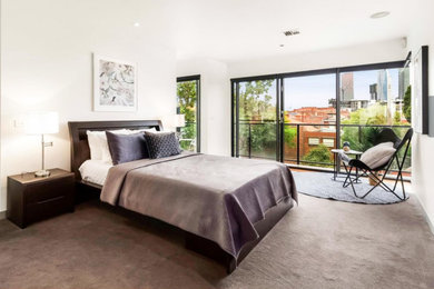 Inspiration for a modern bedroom in Melbourne.