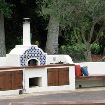 Concrete Pool Deck with Rumford Fireplace, Outdoor Kitchen, Bocci Court & BBQ
